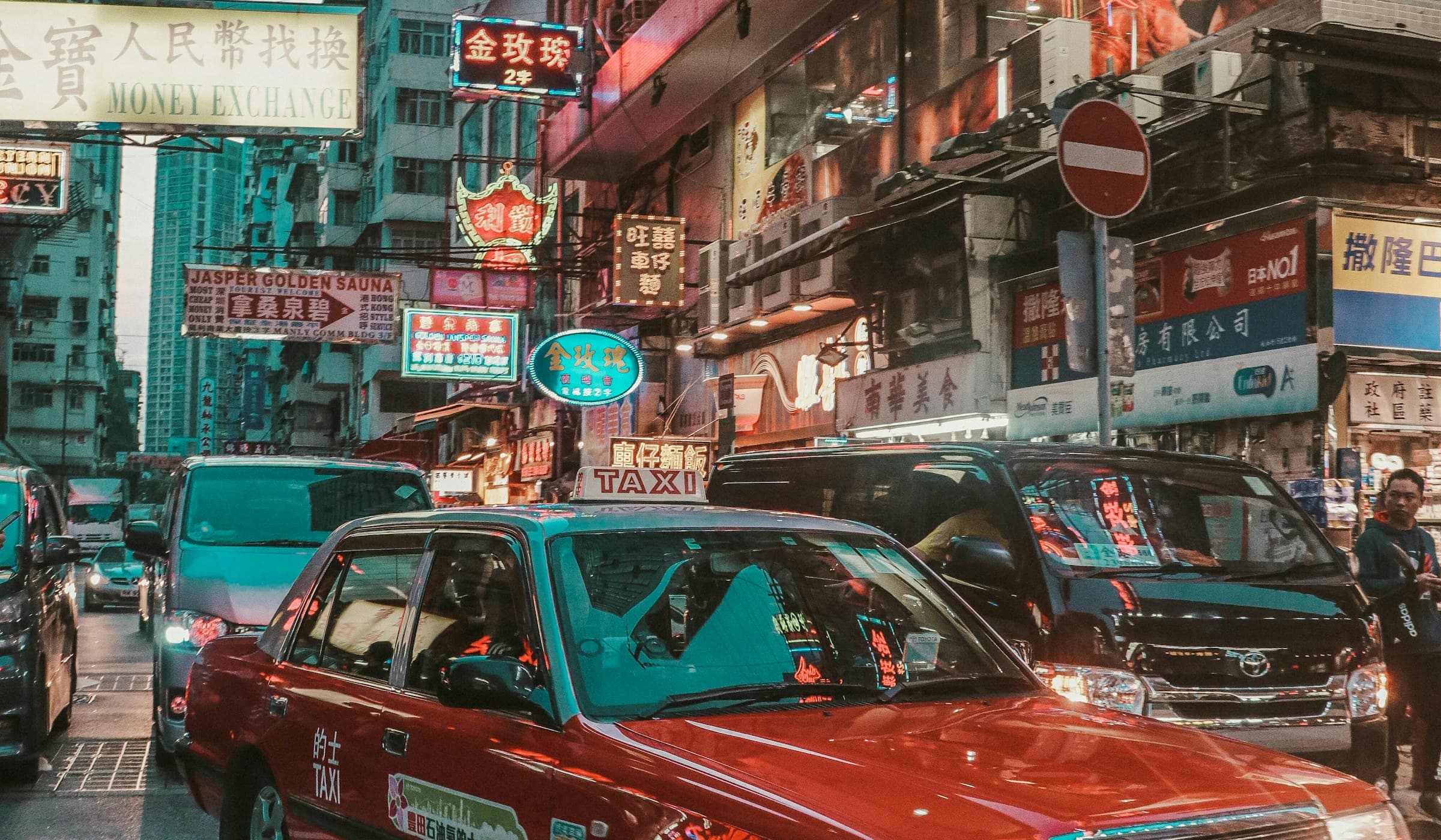 Taxis waiting in traffic on a Hong Kong street